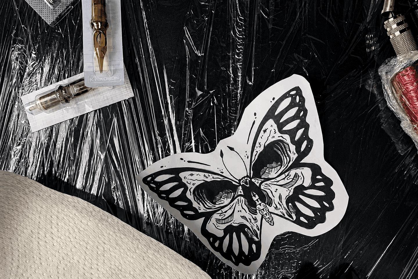 Butterfly tattoo design and needles