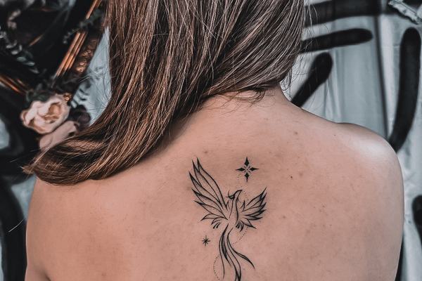 Geometric blackwork tattoo with crescent moon design