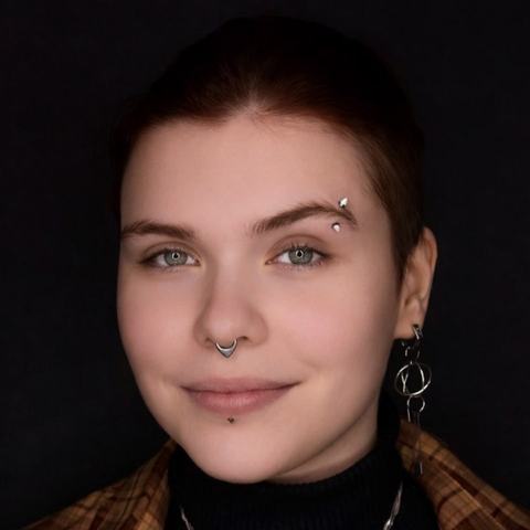 Septum, eyebrow and labret piercing combination with a bold but polished alternative style. Each accent was placed carefully to suit the client’s features, creating a clean, symmetrical and expressive result.